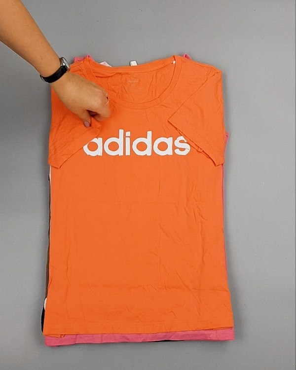 Фотография  499 - Cream Футболки поло женские#25 кг оптом в Рязани и Рязанской области